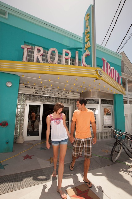 A couple walking in front of the Tropic Cinema in Key West