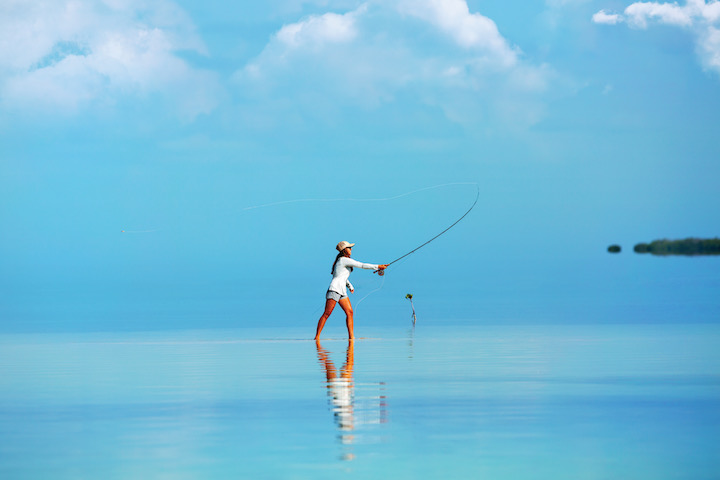 A woman fly fishing