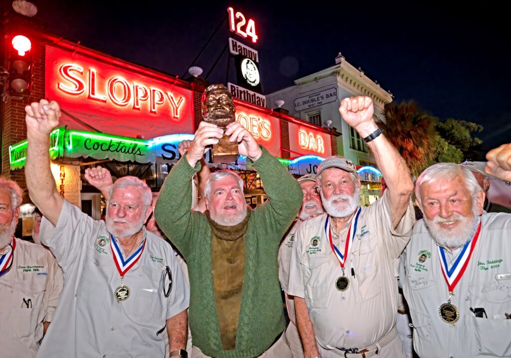 Group of contestants in the annual Hemingway Look-Alike Contest held at Sloppy Joe's Bar.