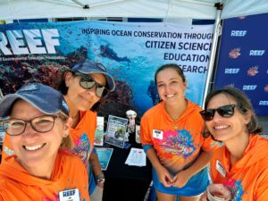 Jill Kuehnert and the REEF team engage with the public at a community outreach event, sharing their passion for marine conservation and inspiring ocean stewardship throughout the Florida Keys. (Photo courtesy of Jill Kuehnert)