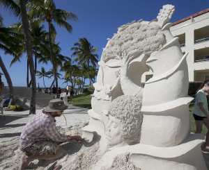 Abe Waterman works on his intricate sand art tribute to Jimi Hendrix (Photo by Rob O'Neal, Florida Keys News Bureau/HO)