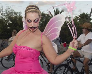 Face and body painters at the pre-ride Zombieland gathering will help participants (like the lovely fairy here) "transform" into zombies. (Photo by Rob O'Neal, Florida Keys News Bureau)