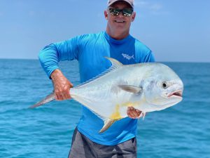 Angler holding permit Florida Keys