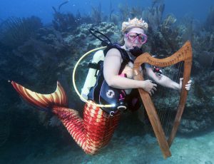 Mermaid playing harp in Florida Keys