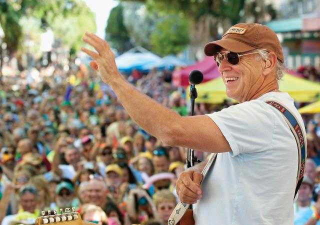 Silent auction memorabilia includes items donated by famed singer-songwriter Jimmy Buffett. Image: Rob O'Neal