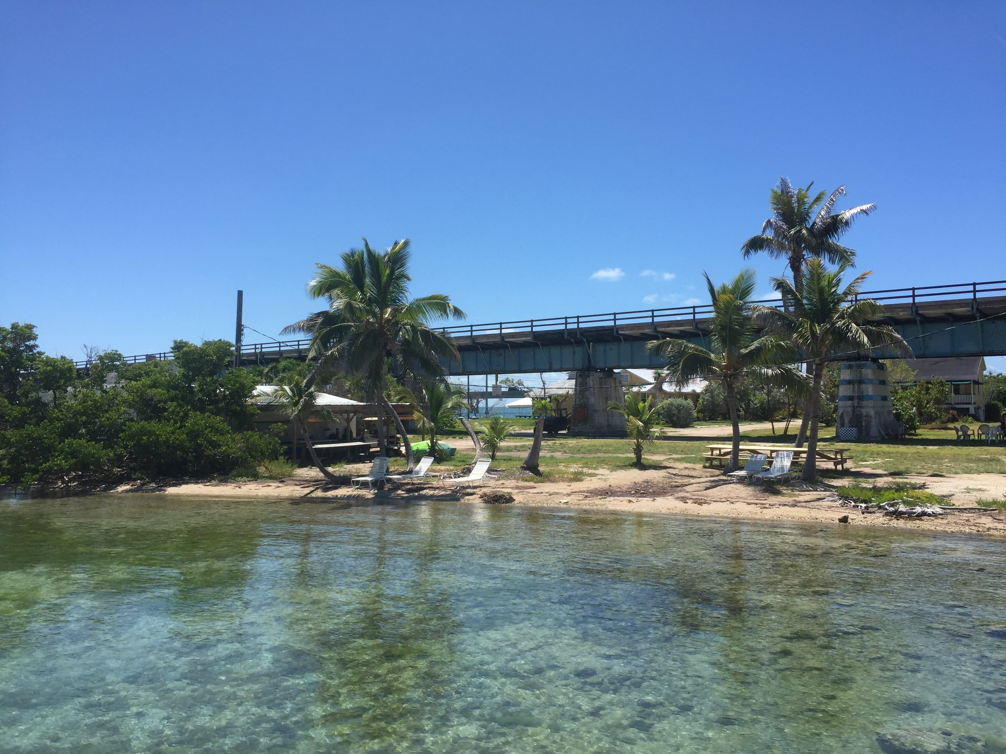 World-famous Pigeon Key is a small island beneath the Old Seven Mile Bridge that housed workers constructing the Florida Keys Over-Sea Railroad in the early 1900s. 
