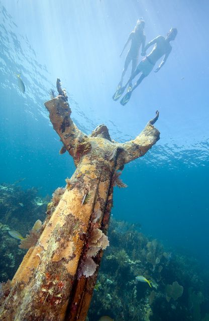 In shallow, neighboring waters to John Pennekamp Coral Reef State Park is the famous Christ of the Abyss statue. Image: Stephen Frink