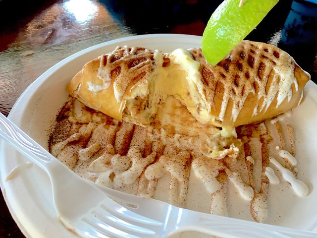 Burdines' fried Key lime pie, a chimichanga-like plateful of tangy sweetness, is unavoidable and made with enough tastes for three people.