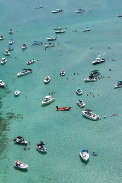 Festival attendees can enjoy watersports excursions and other popular island activities. 