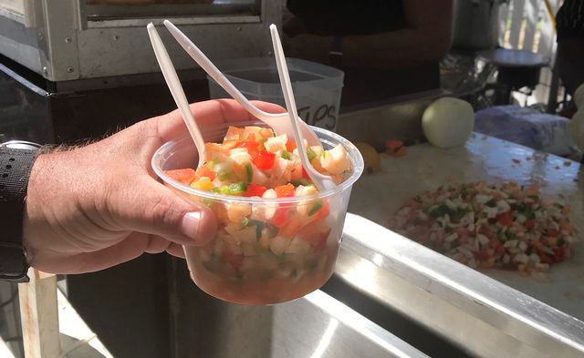 Grab a freshly prepared serving of conch ceviche as you stroll the open air markets. 