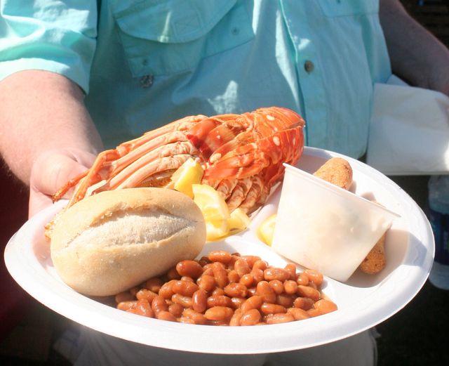  Hundreds of volunteers serve up the tasty Florida Keys favorites with sides of baked beans, coleslaw, hush puppies or French fries. 