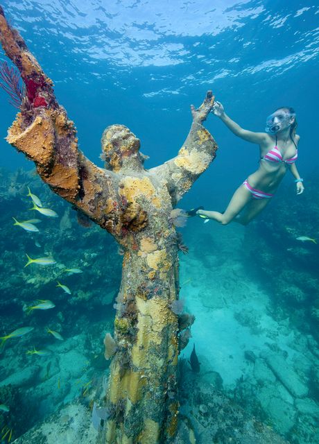 The nine-foot-tall, 4,000 pound Christ of the Deep statue is submerged in 25 feet of water at Key Largo Dry Rocks. Photo: Stephen Frink