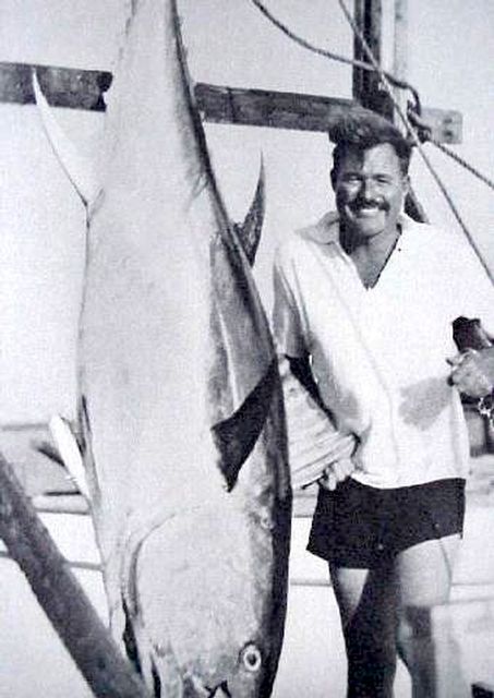 Hemingway with a marlin.