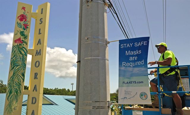 More than 100 banners are being installed along the Florida Keys Overseas Highway and in the city of Key West to communicate COVID-19 protective measures, including the mandatory wearing of masks, that are in place throughout the island chain.