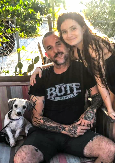 Oliverio with daughter Bella and dog Riki.
