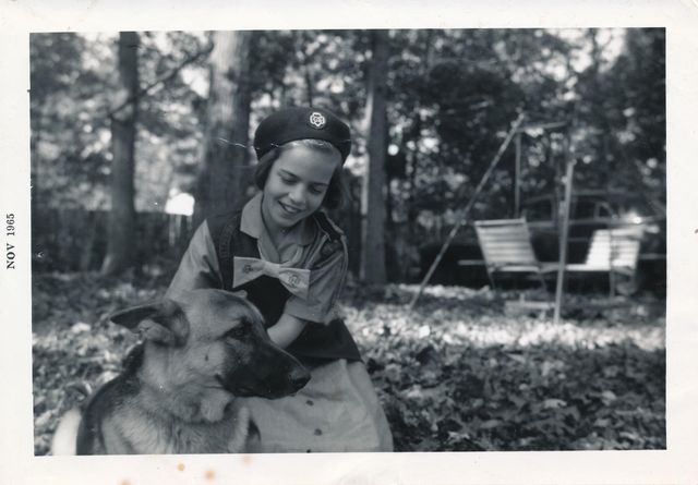 Muratori as a child with the family dog.