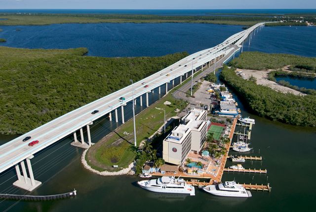 Motorists cross the Jewfish Creek Bridge to enter Key Largo from the mainland.