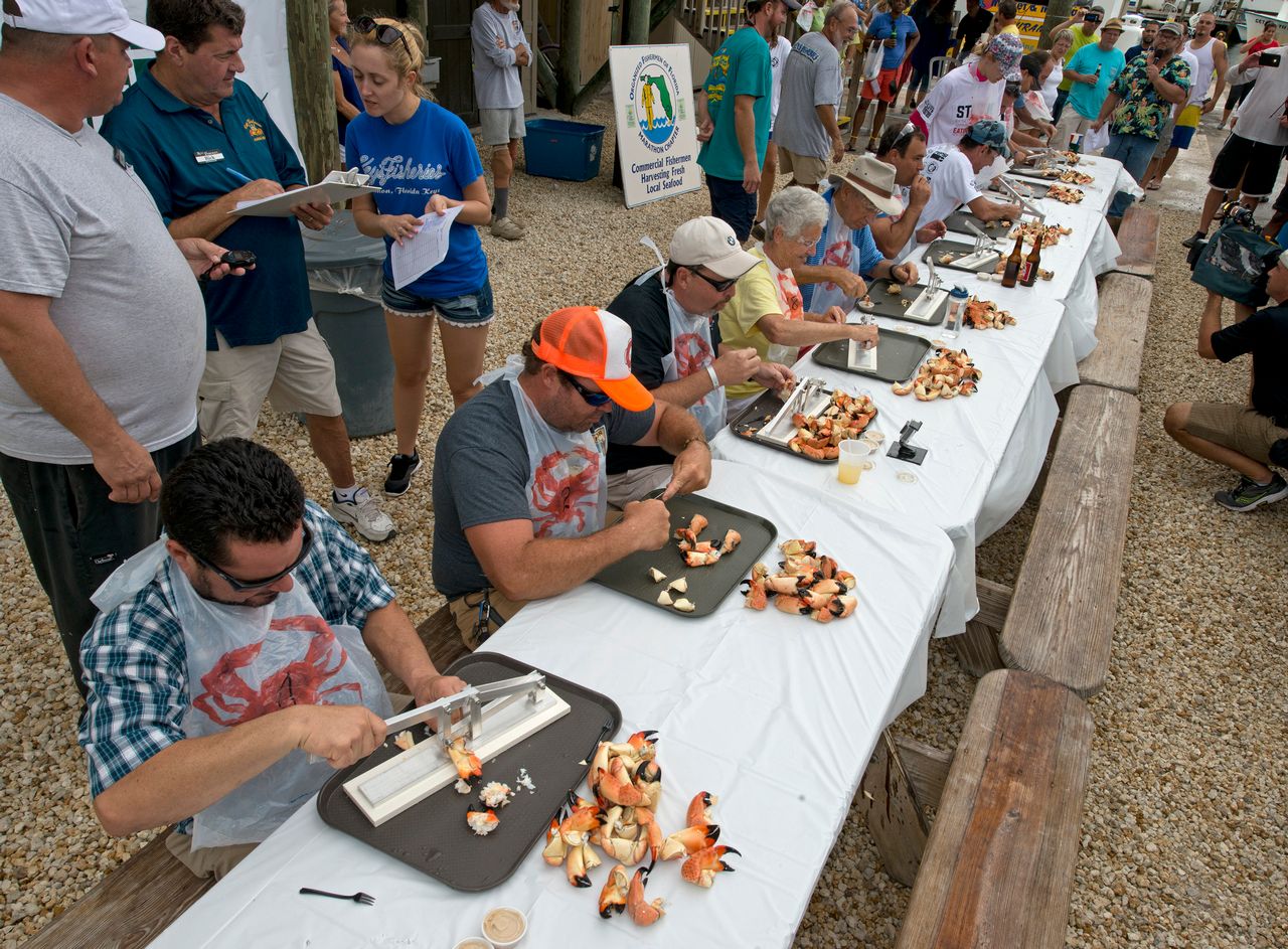 Contestants compete to crack, clean and chow down 25 stone crab claws in the fastest time. 