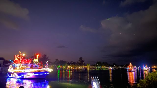 Highlights include a lighted boat parade with decorated fishing vessels, sailboats, schooners and even dinghies.
