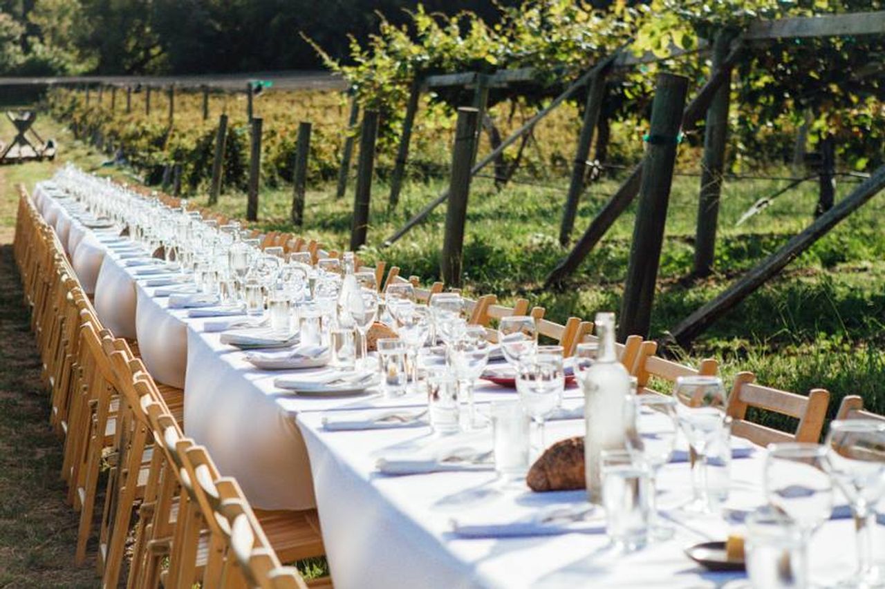 Outstanding in the Field is an internationally known 'traveling restaurant without walls' that celebrates local farmers and regional cuisines via pop-up dinners at iconic venues. Images: OITF
