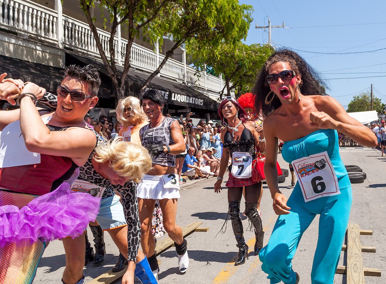The event’s main attraction, however, is the female impersonators competing in pancake makeup, extravagant wigs and race-mandated high-heeled footwear.