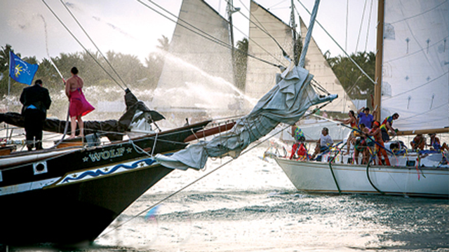 During the Great Sea Battle of the Conch Republic, sea dogs and wenches on tall ships and other vessels combat “evil federal forces” and the republic always wins. Image: Conch Republic Independence Celebration