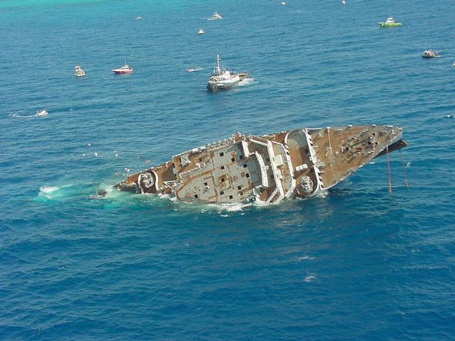 On May 17, 2002, Spiegel prematurely partially sank and rolled over, leaving the ship's upside-down bow protruding above the surface of the water.