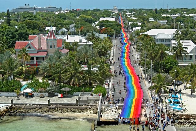 The 1.25-mile-long rainbow flag was created by the late Gilbert Baker, creator of the original rainbow flag.