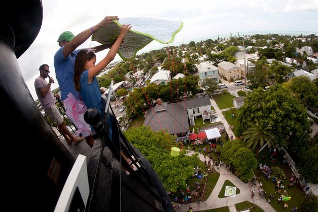 After crafting contraptions to protect miniature pies, Pie Drop contestants must drop their creations from atop the Key West Lighthouse. Image: Key Lime Festival
