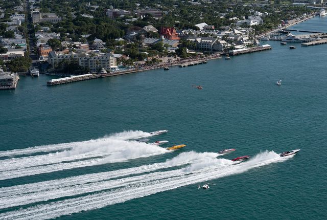 Super Stock-class boats cross the start line during the 2021 Race World Offshore Key West Championships in Key West, Fla. 