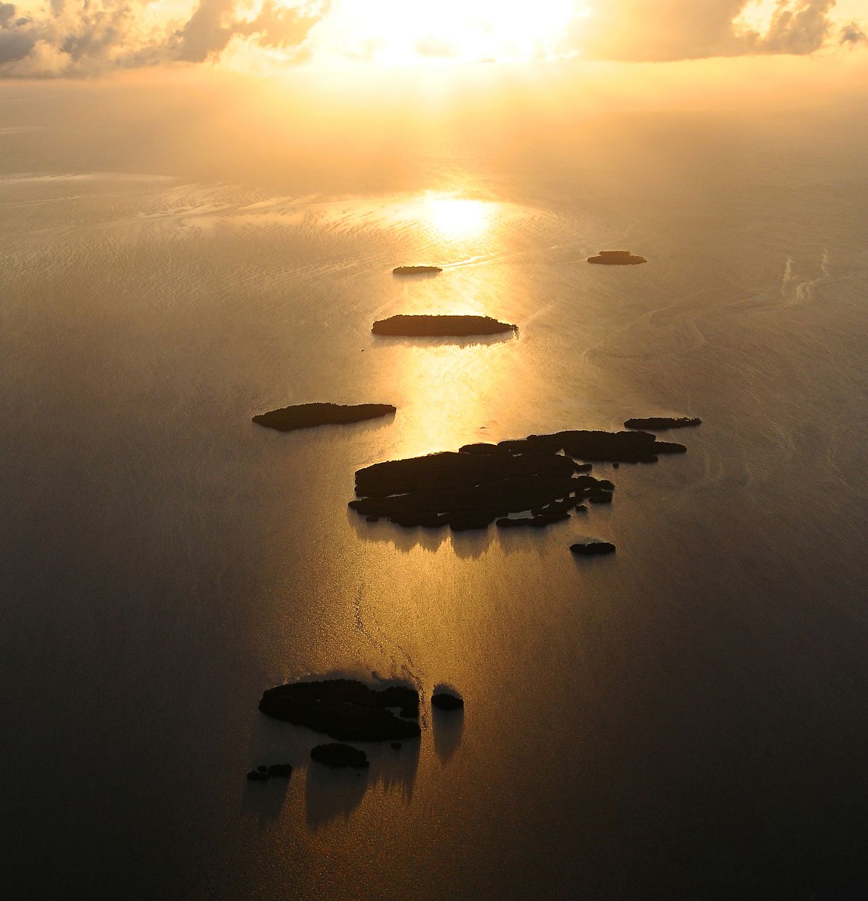 An aerial view off Key West, Fla., shows uninhabited islands of the Lower Florida Keys at sunset. The Lower Keys are renowned for their eco-attractions and pristine natural environment. (Rob O'Neal/Florida Keys News Bureau)