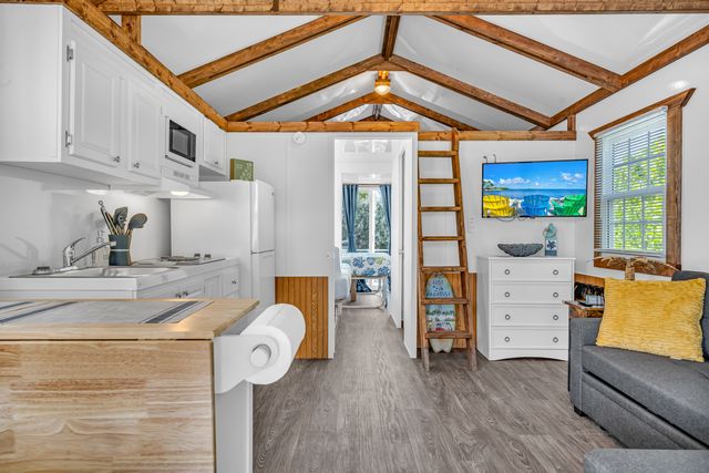Each air conditioned Aqua Lodge offers a full kitchen, flat screen TV and accommodates up to four adults and two children in 350 square feet of space. 