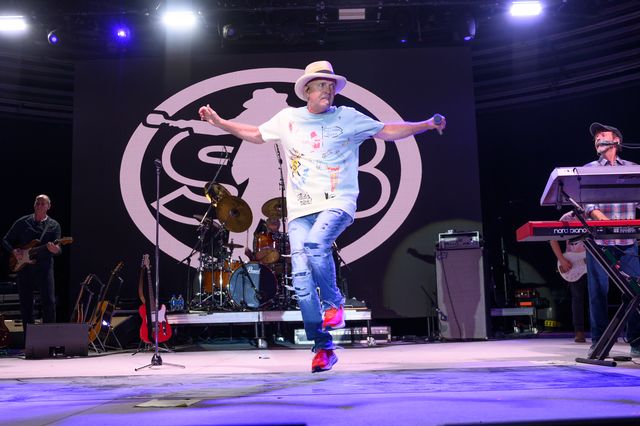 Singer-songwriter Mark Miller, frontman of the Ohio-based band Sawyer Brown gets air Thursday night Feb. 2 while doing his signature dance moves at the Key Western Fest at the Coffee Butler Amphitheater. Photo: Rob O'Neal