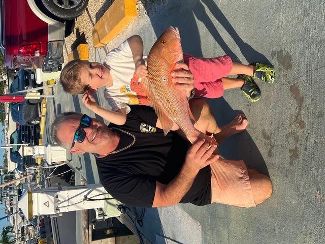 Mirabella with son Ian and another fresh catch.
