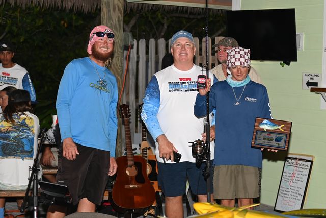 Corbin Buckley won a rod and reel combo, taking the top junior angler title with a 15-pound dolphin fish. 