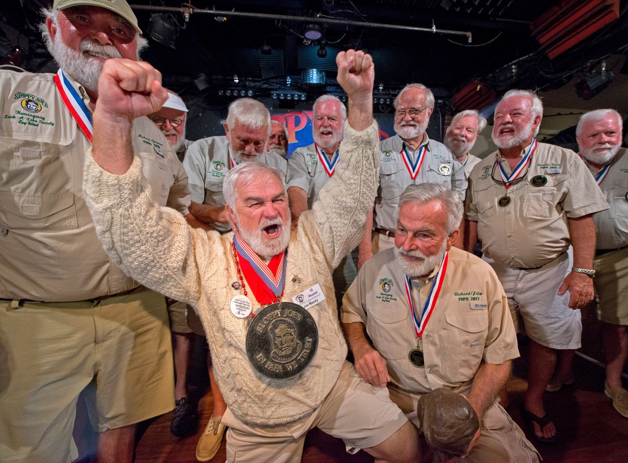 Joe Maxey, second from left, celebrates his victory at the 2019 Hemingway Look-Alike Contest at Sloppy Joe's Bar. Photo: Andy Newman