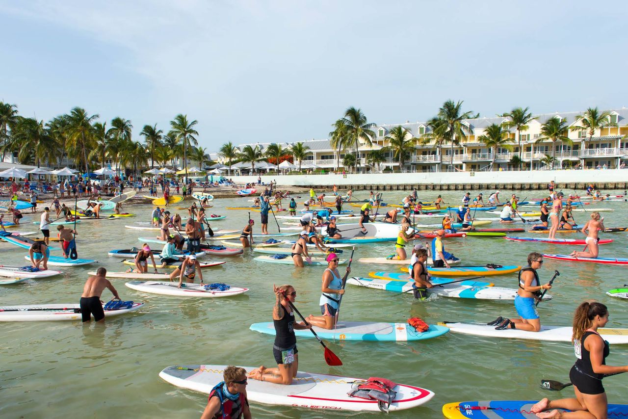 Paddleboard entrants paddle a 3-mile Atlantic Ocean course that starts and ends at Key West's Higgs Beach. 