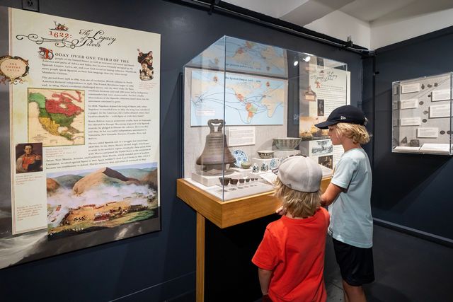 Young visitors to Key West's Mel Fisher Maritime Museum view artifacts from the museum's new exhibit. Photo courtesy of Mel Fisher Maritime Museum