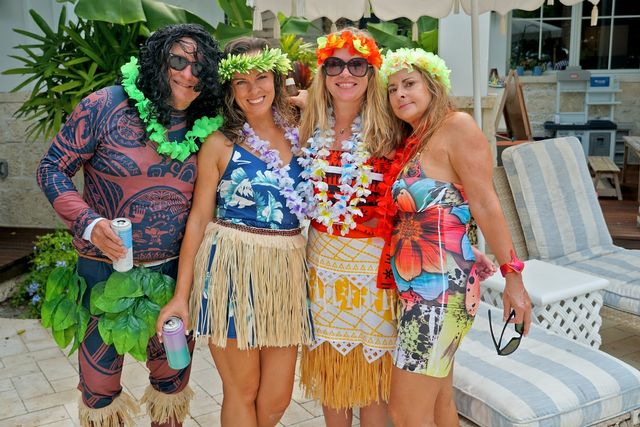 Participants vie for trophies for best score and for best costumes. This foursome is outfitted as characters from the Disney film Moana. 