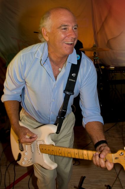In this Saturday, March 19, 2011, photo, singer Jimmy Buffett belts out a song during a close friend's wedding reception on Sugarloaf Key. Photo: Andy Newman/Florida Keys News Bureau