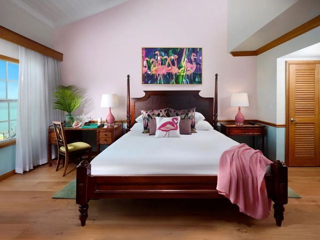 Ocean Key Resort's Flamingo Royale Suite features dynamic colors, bold wallpaper and tropical accents. 