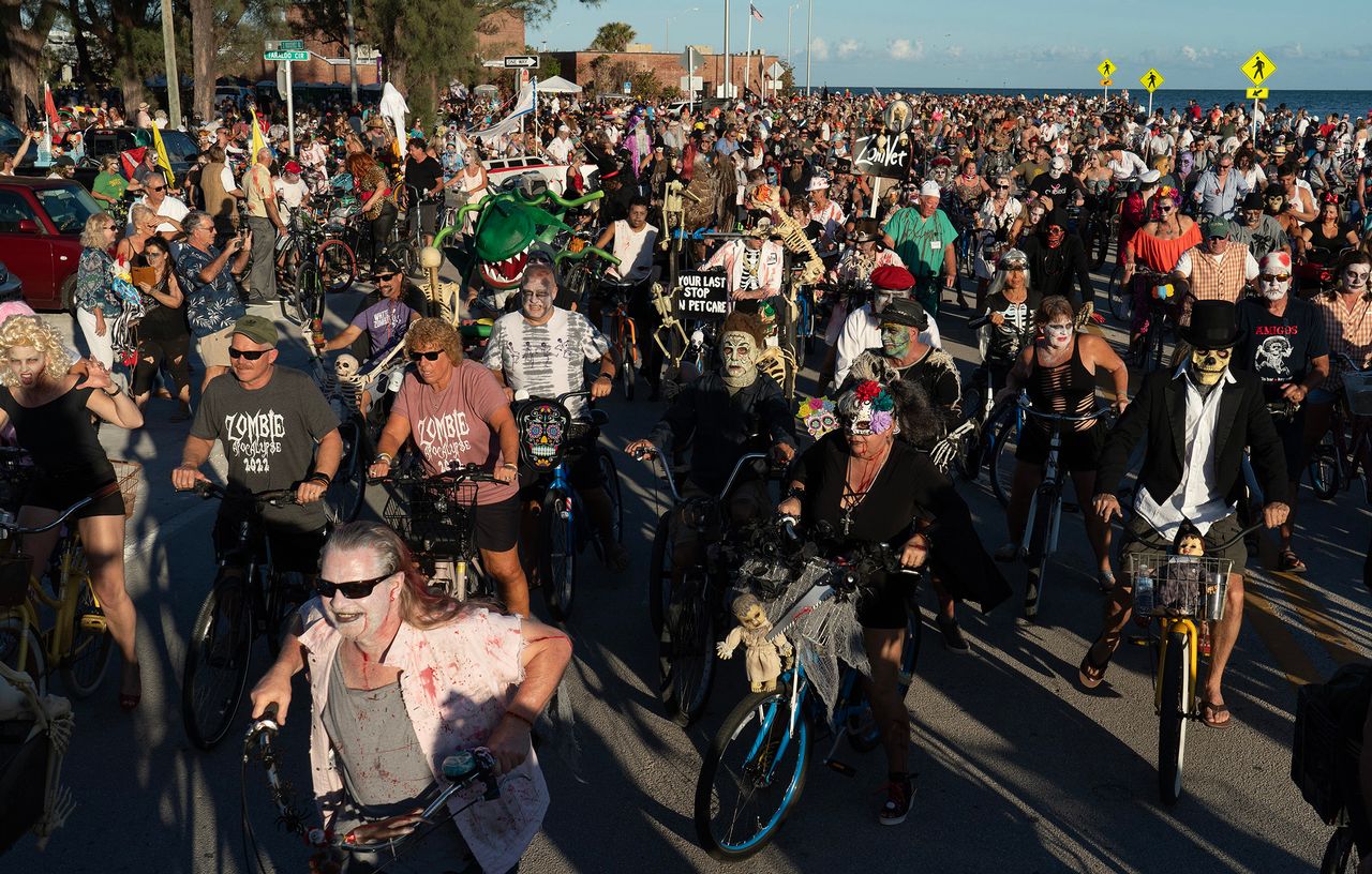 Key West zombies hop on their bikes and cheerfully pedal beside the Atlantic Ocean during the island’s annual Zombie Bike Ride. Photos by: Rob O'Neal