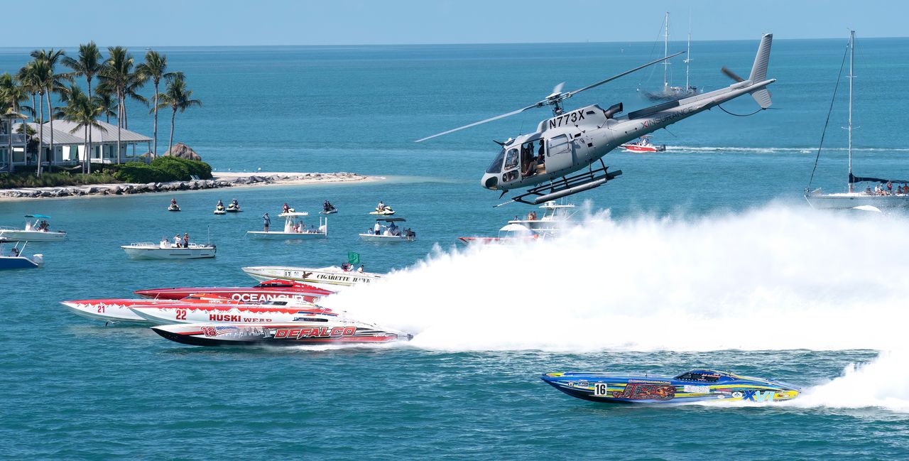 Offshore powerboat racing entries cross the start line on the final day of racing during the 2022 championships in Key West. Photo: Rob O'Neal