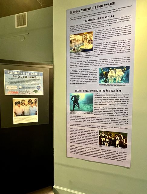 The exhibit explains NEEMO — the NASA Extreme Environment Mission Operations project — that sends groups of astronauts and scientists to live in the world's only undersea research station located 3.5 miles off Key Largo.  