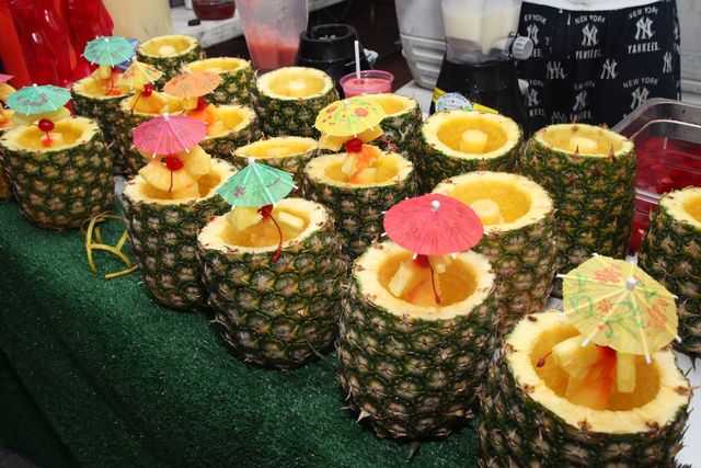 Island-style drinks served in hollowed-out pineapples may be sipped while browsing arts and crafts booths and choosing from a wide selection of multicultural foods. 