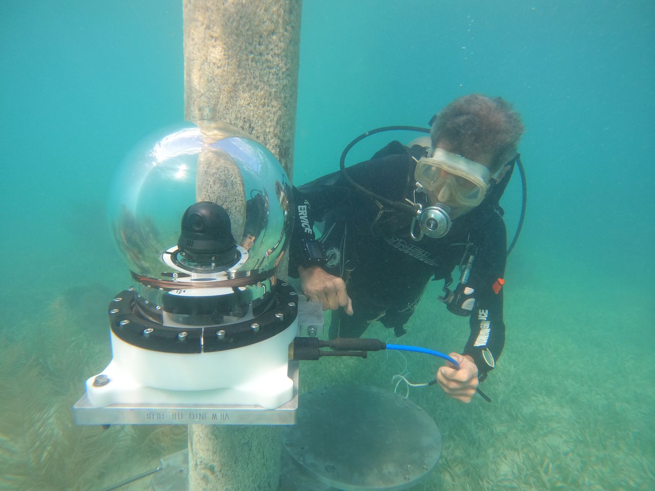 Terry Helmers spends many hours volunteering on underwater projects with the Florida Keys National Marine Sanctuary and here,  working on adjustments for the coral cam at John Pennekamp Coral Reef State Park. 