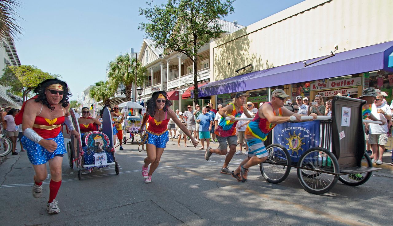 The colorful competition features decorated wheel-mounted beds, each propelled along the famed Duval Street between Olivia and Southard streets.