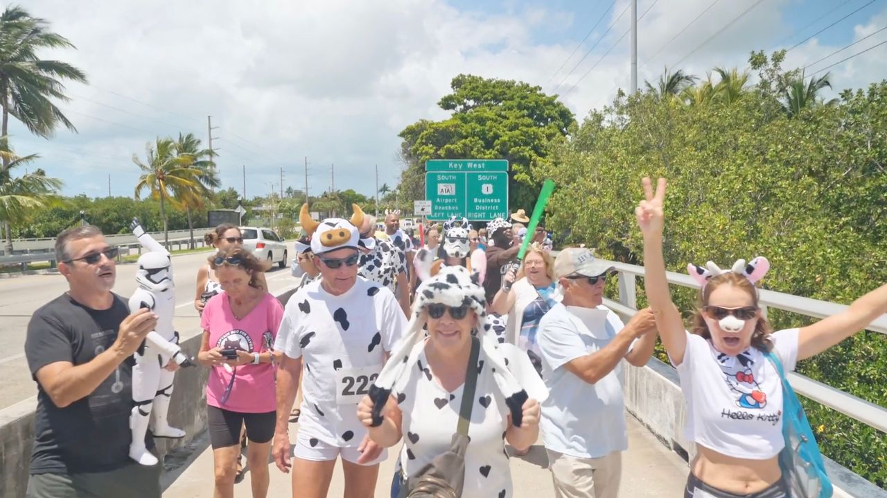 Participants celebrate the zero-k Cow Key Channel Bridge Run and Star Wars Day as they cross the 300-foot-long Cow Key Channel Bridge on May 4th in Key West.