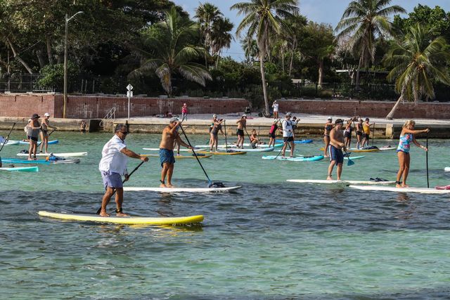 The Paddleboard Race begins this year from Higgs Beach, 1000 Atlantic Blvd on the Atlantic Ocean. 