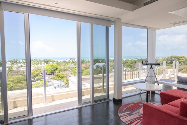 Floor-to-ceiling windows and balconies provide sweeping view of this island of Key West at La Concha's new Grand Dame Villas at the Rooftop. Photo: La Concha Key West